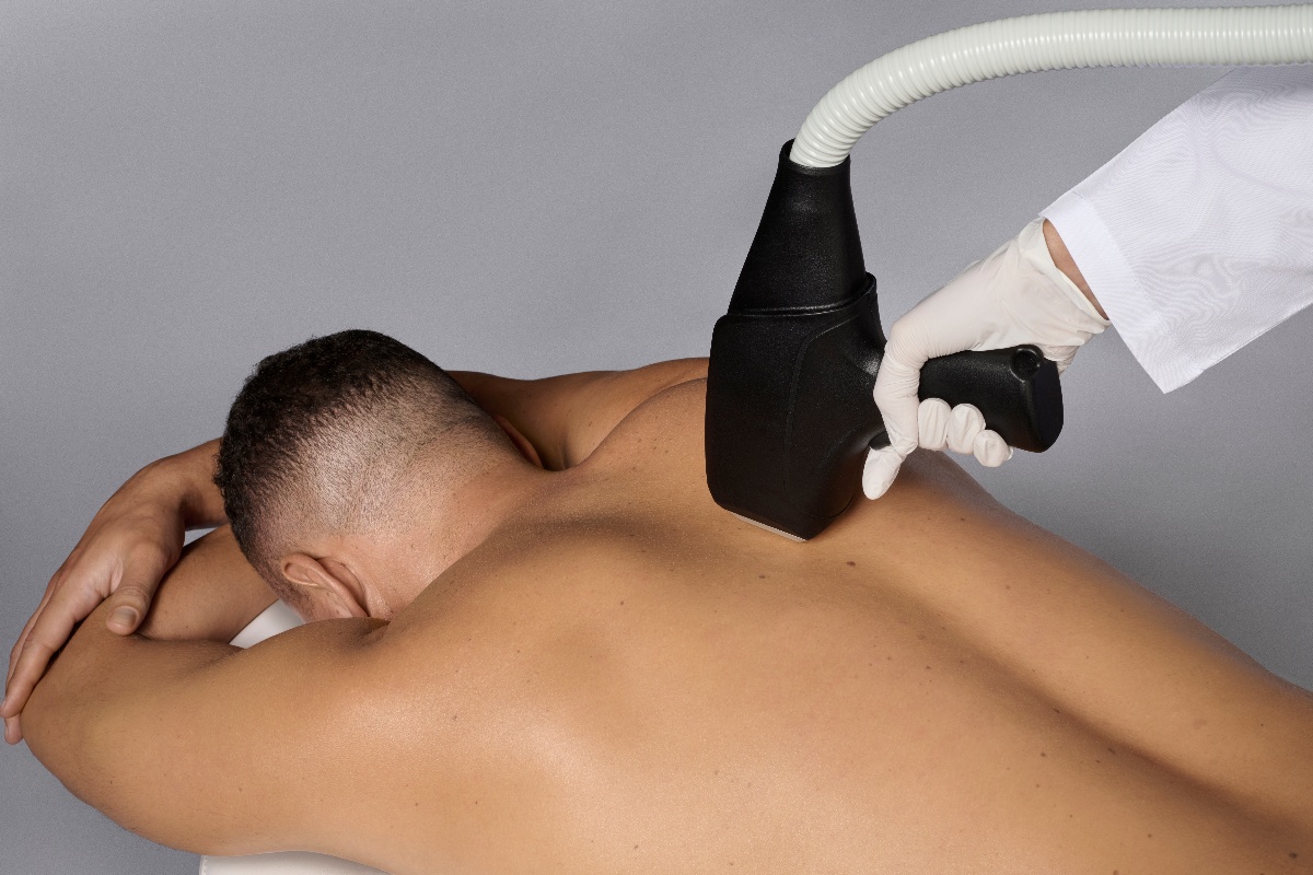 Aliya device being used on males back Aliya device being used on males back